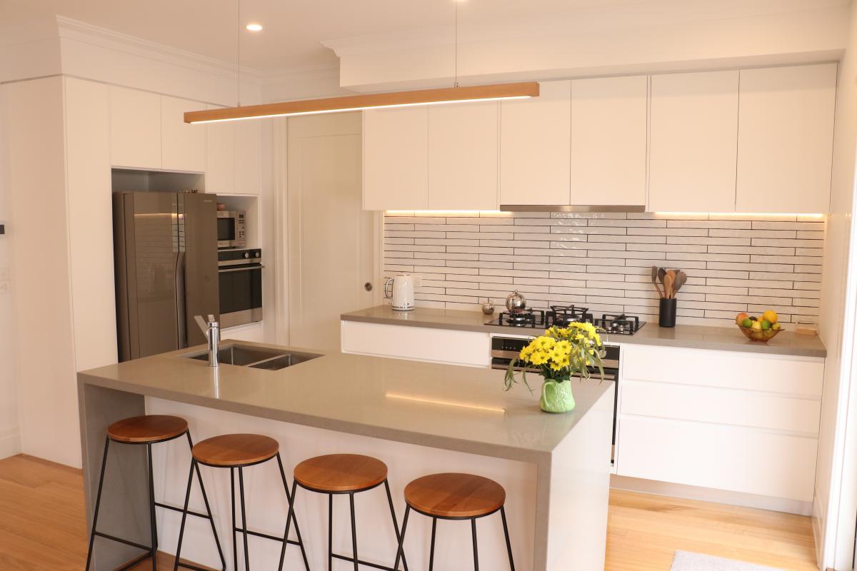A modern kitchen design that can fit your side return extension project.